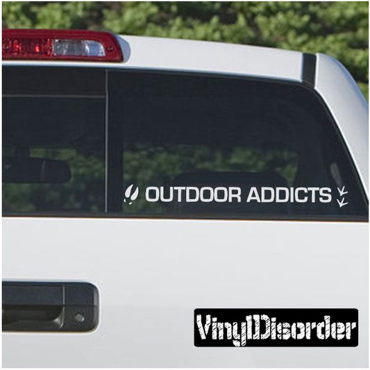 Vinyl car decal with 'OUTDOOR ADDICTS' text and arrow icons on rear window