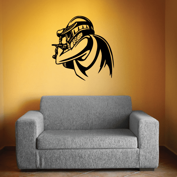 Vinyl wall decal of a black paintball mascot head with goggles and helmet.