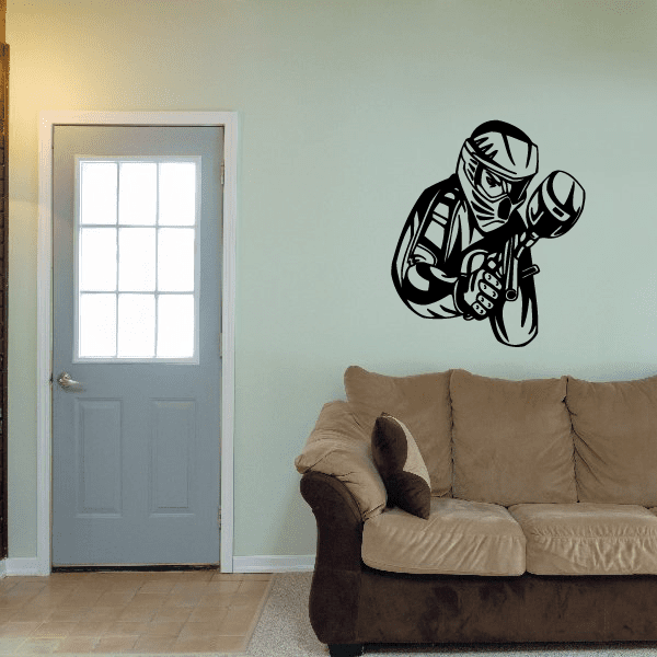 Vinyl paintball player wall decal, black silhouette holding a paintball marker