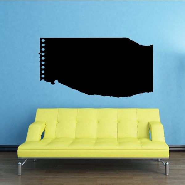 Black notebook page wall decal with punched holes along the left edge