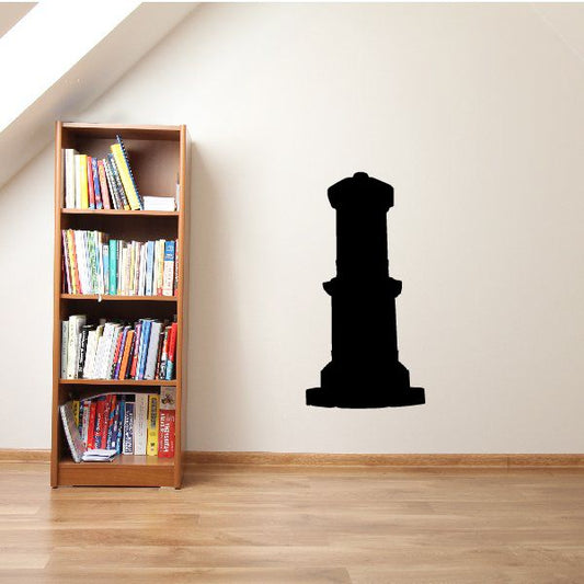 Black pillar building decal with domed top silhouette