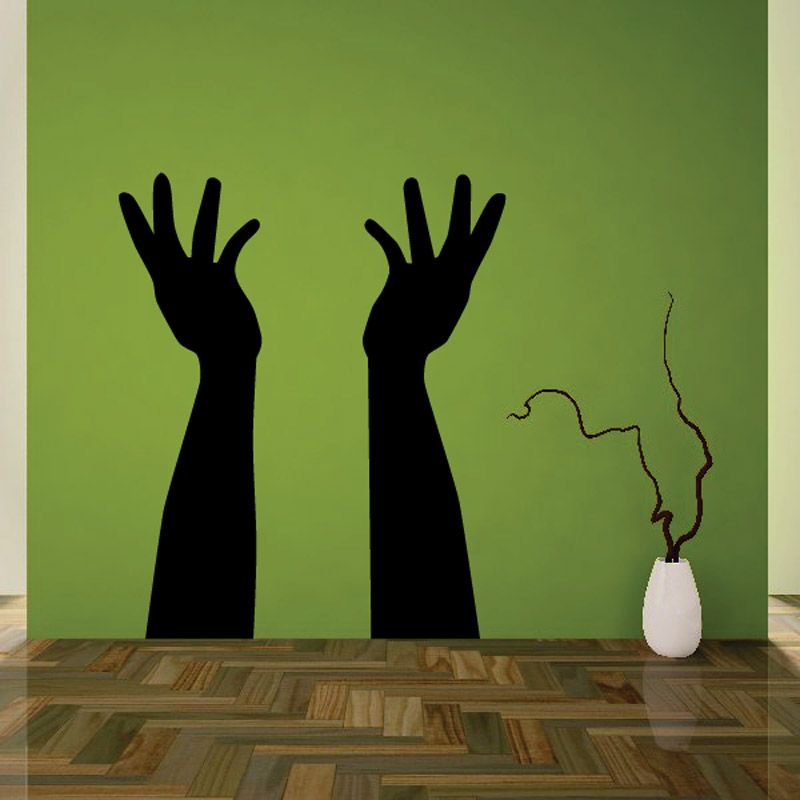 Black raised-hands decal with flowing smoke line curl