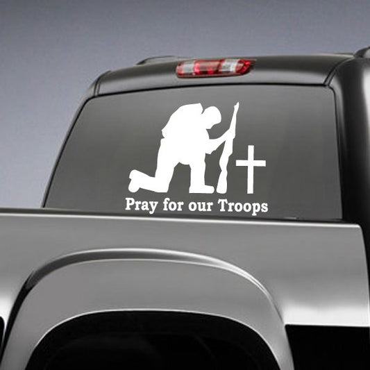 White car decal with praying soldier, cross, and text 'Pray for our Troops'