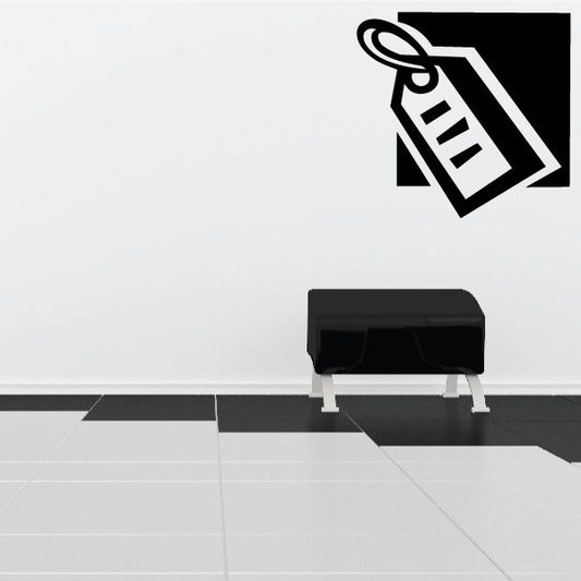 Black price tag decal with looped string and small label graphic