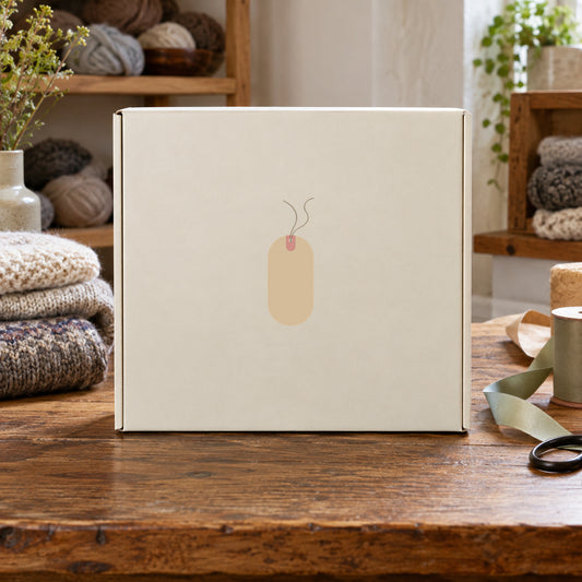 Price tag sticker on beige shipping box with cutout tag icon