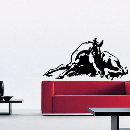 Resting foal wall decal, black silhouette of foal lying down