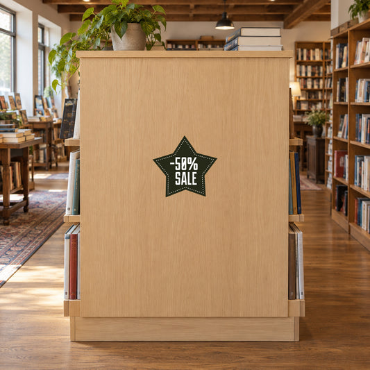 50% Sale Retail Discount Sign Sticker displayed on a bookshop endcap cabinet