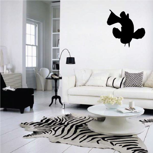 Black rooster vinyl wall decal silhouette on a white wall