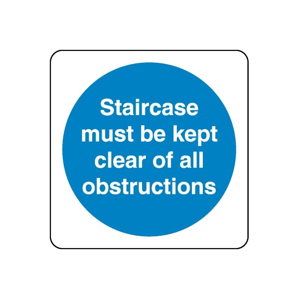 Safety sign decal: blue circle with white text, 'Staircase must be kept clear of all obstructions'