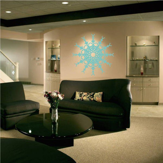 Light blue snowflake wall decal with intricate starburst design