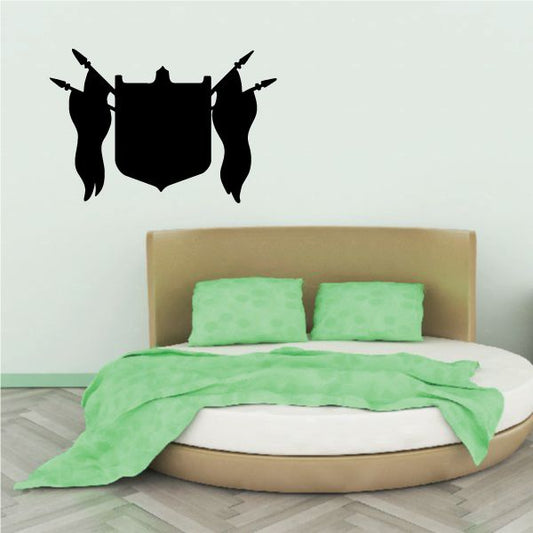 Vinyl shield wall decal in black with shield icon and four standing figures