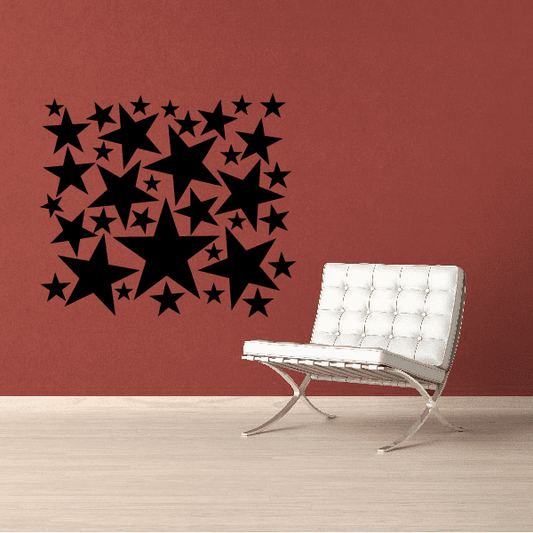 Five-pointed star cluster wall decal, black stars on a surface
