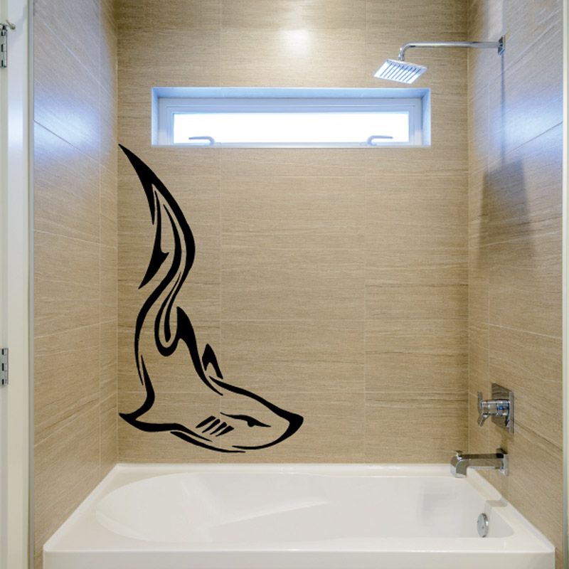 Black side-profile shark decal with stylized fin, tail, and open mouth.