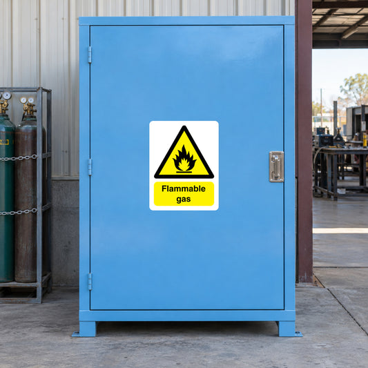 Flammable gas warning sticker with black flame triangle and yellow text