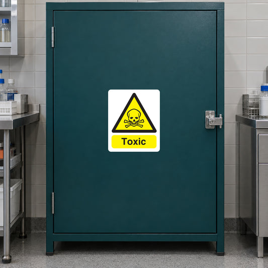 Toxic poison caution sticker with yellow biohazard symbol and “Toxic” text