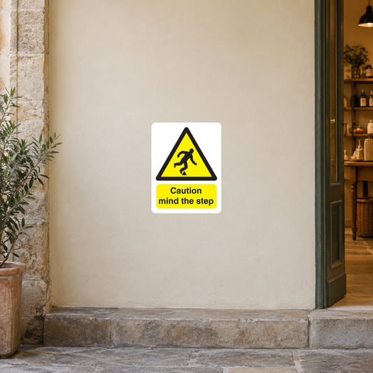 Caution mind the step sticker with yellow triangle and black falling figure icon