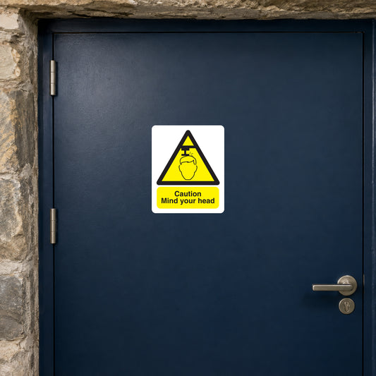 Caution Mind Your Head sticker with yellow warning triangle and stick figure, reads “Caution Mind your head”
