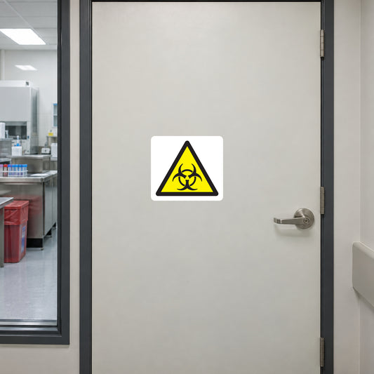 Biohazard warning triangle sticker on a laboratory specimen-room entrance