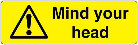 Warning mind your head sticker with yellow background, black triangle, and bold text.