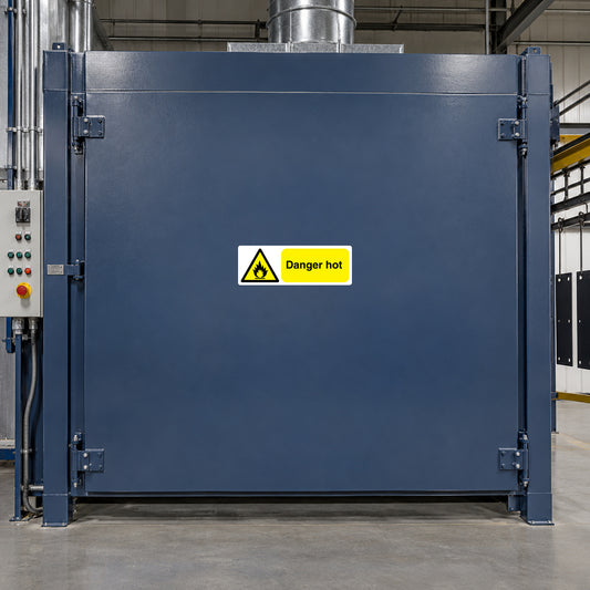 Warning sticker reading Danger hot on blue industrial equipment panel