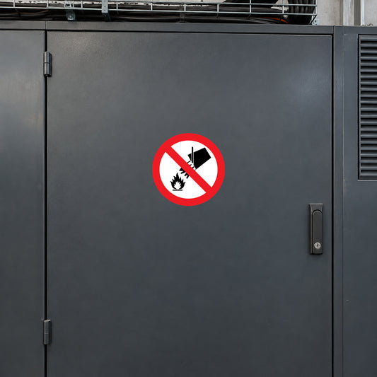 Safety sticker with red prohibition sign over fire and water icon