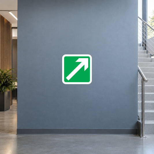 Green square sticker with white arrow pointing up and to the right