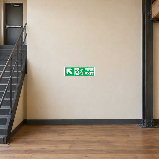 Green fire exit sticker with arrow and “FIRE EXIT” text