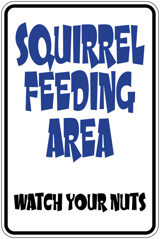 Fun sign sticker with blue squirrel feeding area text and "Watch your nuts"