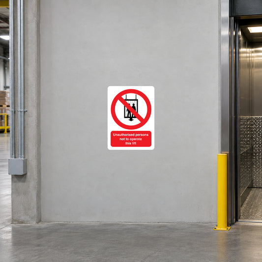 NO Safety Sign Sticker applied in industrial goods lift, solid pale grey SINGLE stationary side wall beside lift opening, lift gate at extreme right only