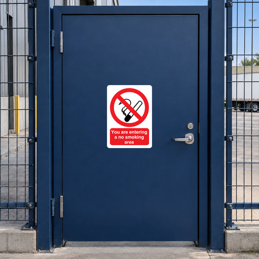 NO Smoking Sign Sticker applied in solid navy entry gate for a distribution warehouse pedestrian route