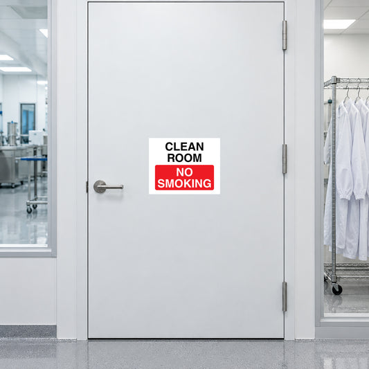 NO Smoking Sign Sticker applied in white cleanroom entrance door in a precision manufacturing facility, gown rack at far side
