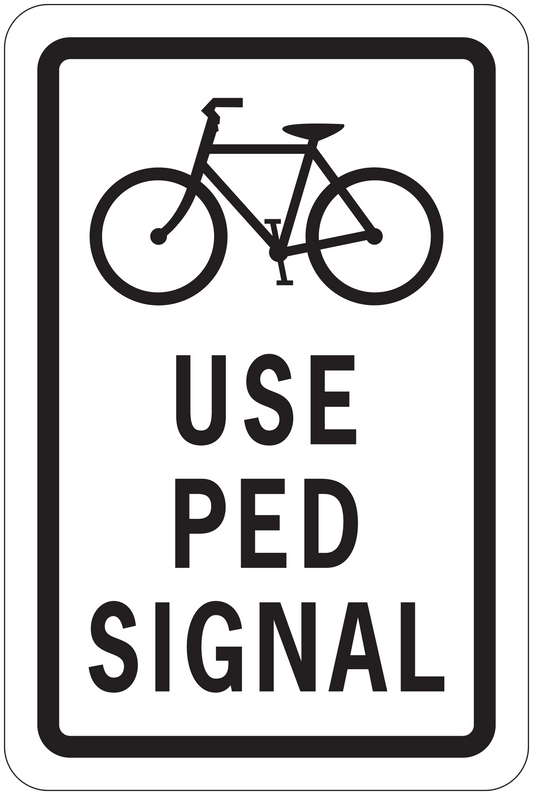 Road sign sticker with bicycle icon and bold text "USE PED SIGNAL"