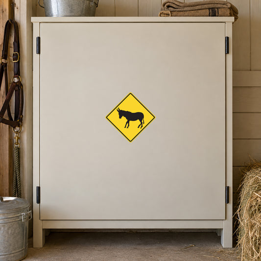 Road sign sticker with yellow diamond and black bull silhouette