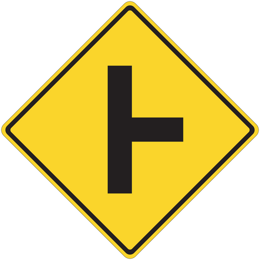 Yellow road sign sticker with black left-turn arrow inside a diamond border
