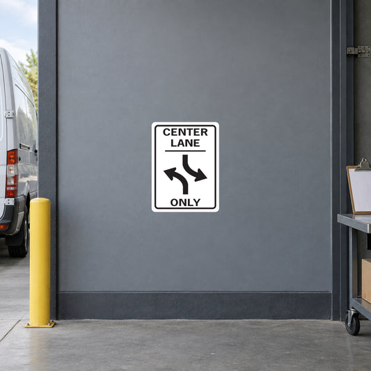 Road sign sticker: CENTER LANE ONLY with two lane arrows.