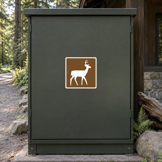 Rectangular road sign sticker with deer silhouette icon inside brown border