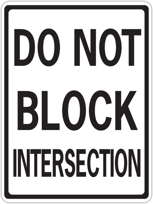 Road sign sticker with bold black text: DO NOT BLOCK INTERSECTION
