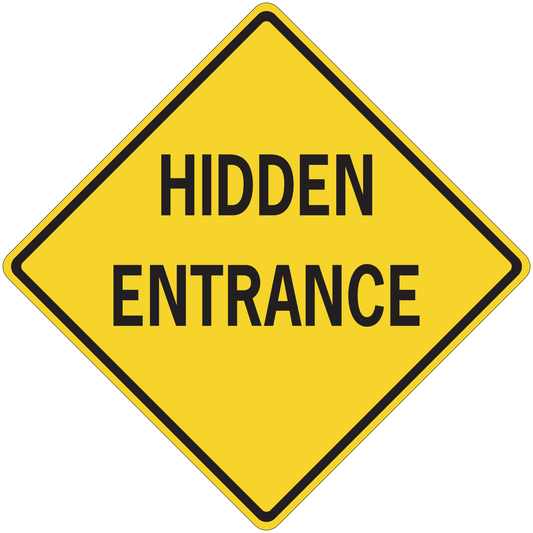 Road sign sticker: yellow diamond with bold "HIDDEN ENTRANCE" text