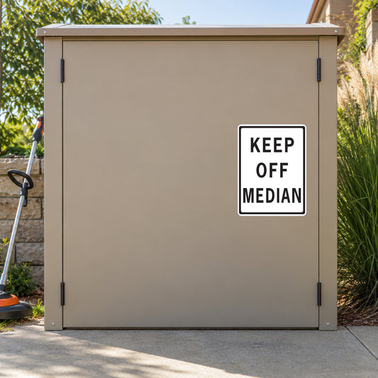 Road sign sticker with 'KEEP OFF MEDIAN' text