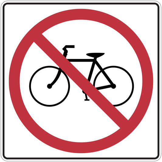 Road sign sticker showing a bicycle with a red prohibition slash symbol