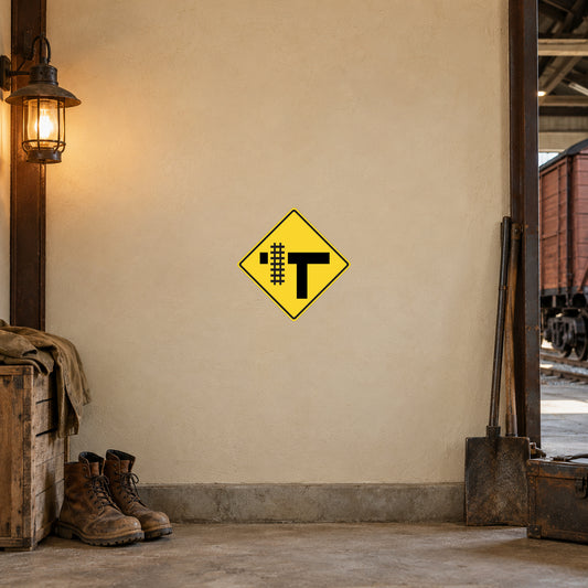 Yellow diamond road sign sticker with black T and grid details
