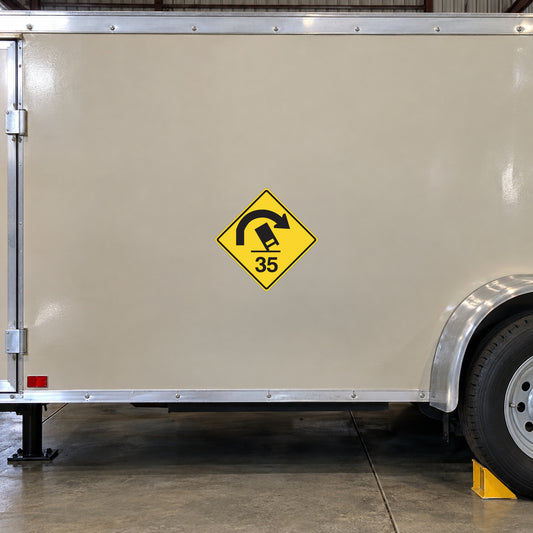 Yellow road sign sticker with black curved arrow and '35' numerals