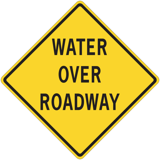 Yellow road sign sticker with black border reading "WATER OVER ROADWAY"