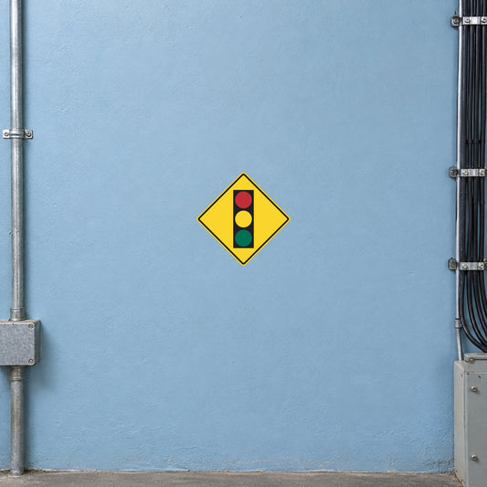 Road sign sticker: yellow diamond with traffic-light dots icon