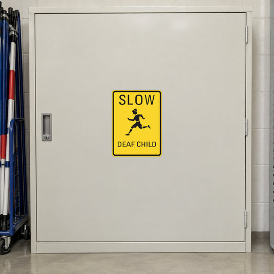 Yellow road sign sticker with “SLOW” and “DEAF CHILD” warning graphic