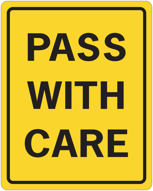 Yellow road sign sticker with black border and text 'PASS WITH CARE'