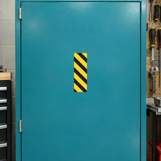 Road sign sticker with black and yellow diagonal hazard stripes, rectangular shape