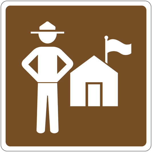 Road sign sticker with white traffic guard holding a flag near a small house