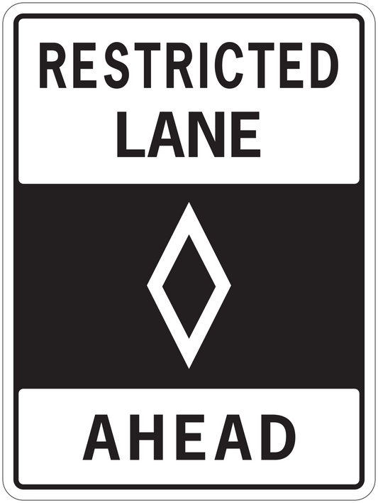 Road sign sticker: RESTRICTED LANE with diamond symbol and AHEAD text