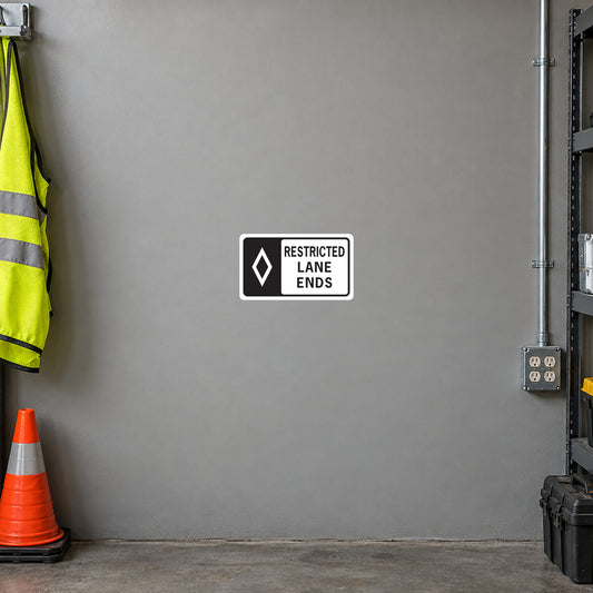 Road sign sticker with white rectangle “Restricted Lane Ends” sign.